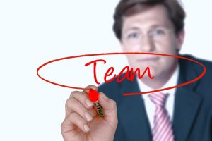businessman-team-hand-write-glass-893492-1024x681